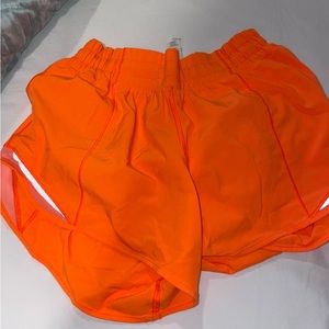 Bright orange lululemon shorts